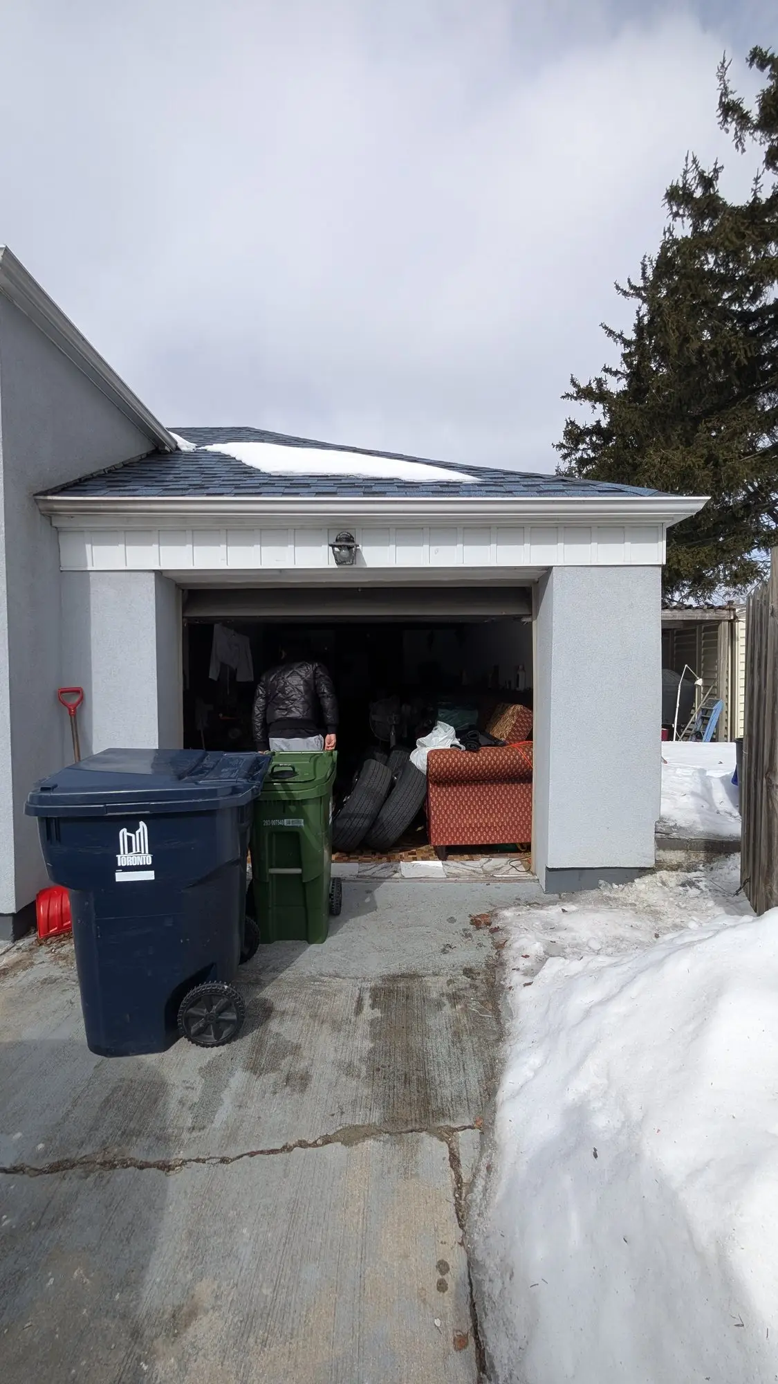The original attached garage and driveway before work began