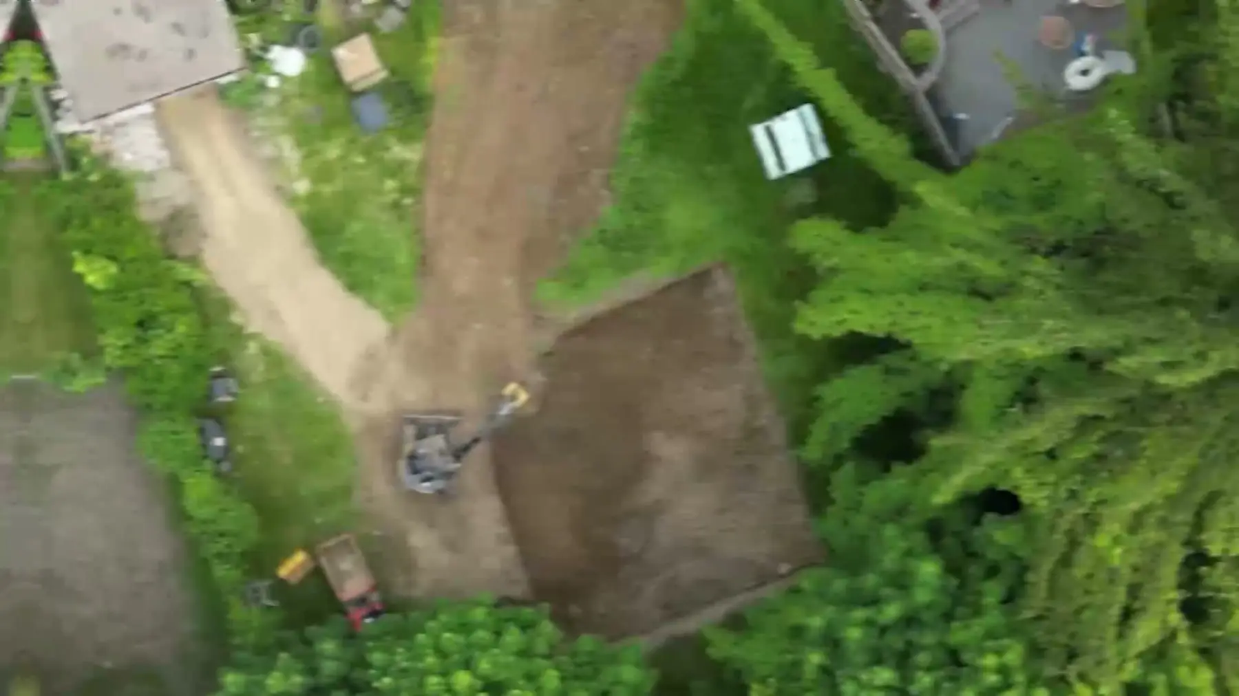 Aerial view of the excavated foundation footprint in the back yard
