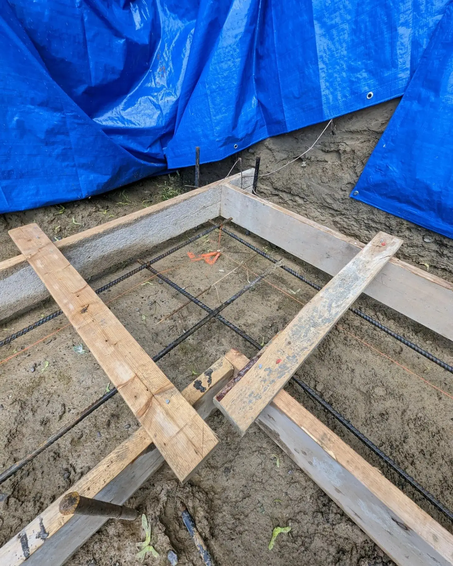 Footing formwork set out on the excavated ground before the pour