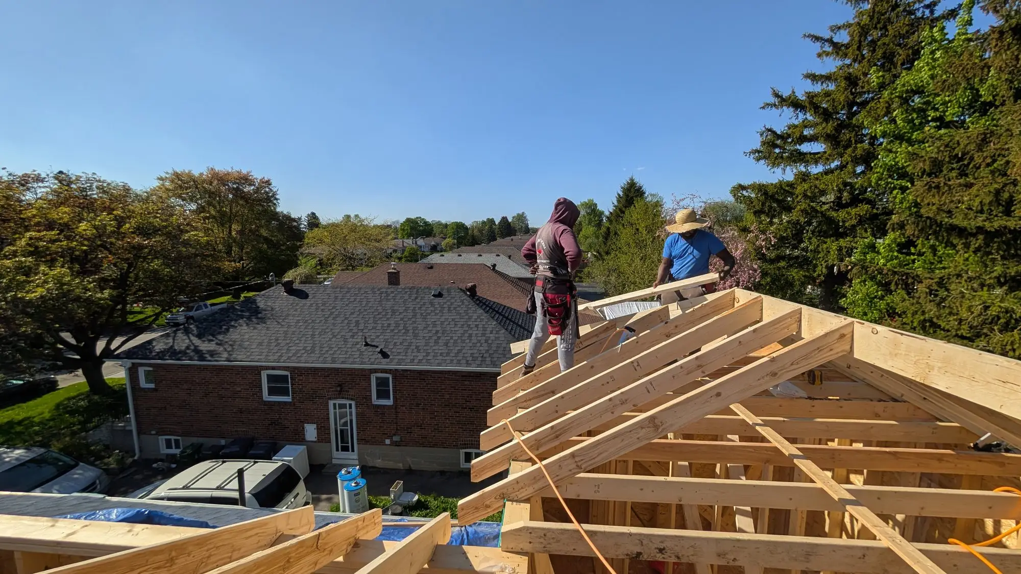 New roof structure being framed over the house