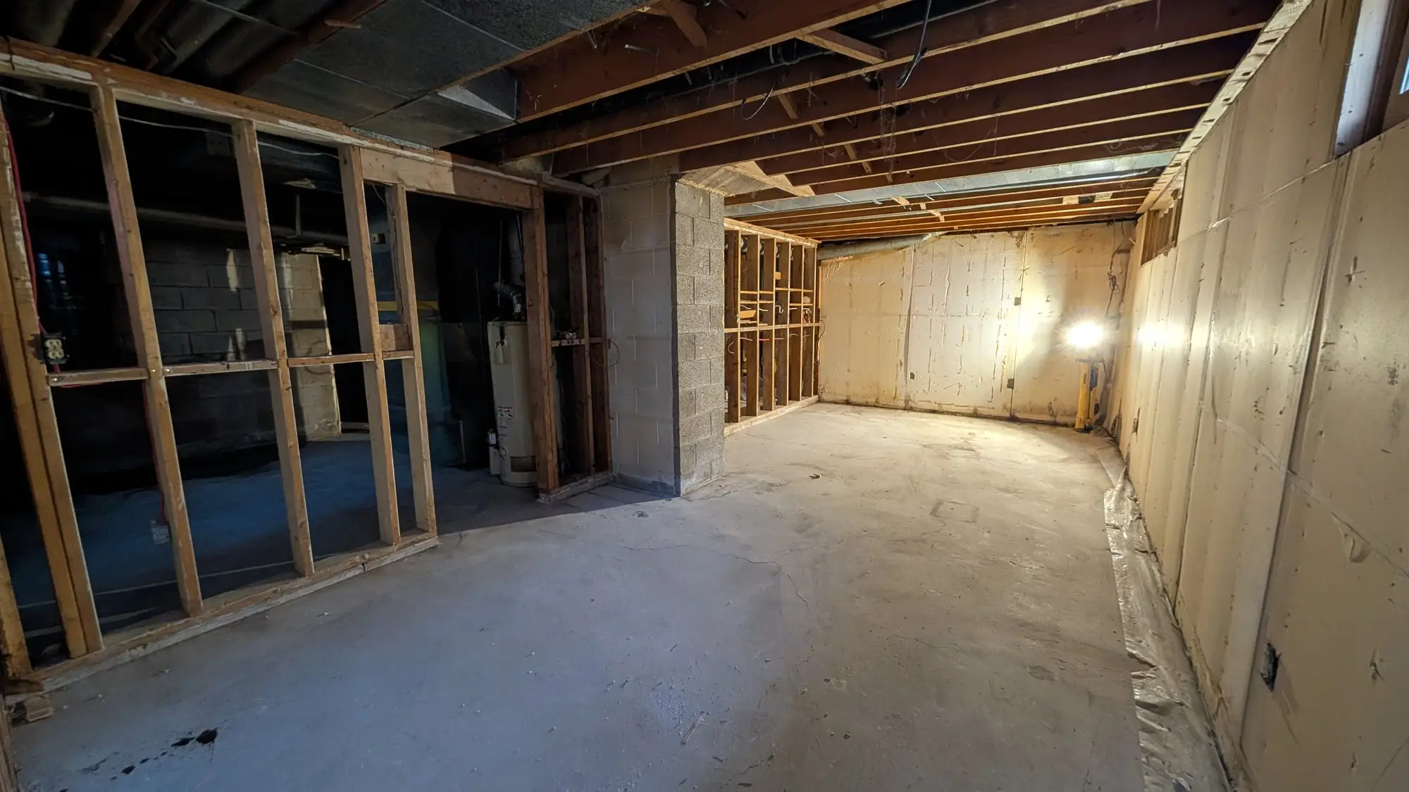 The basement stripped back to bare block walls