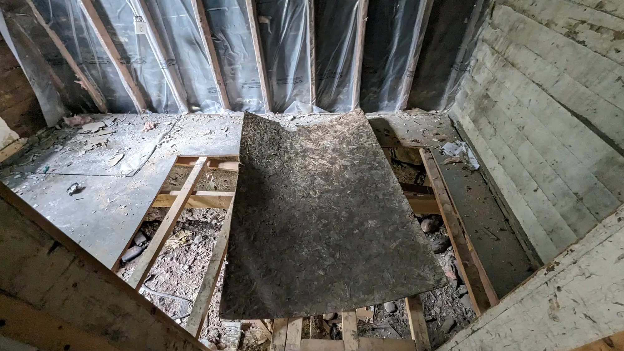 The stair opening reframed during demolition