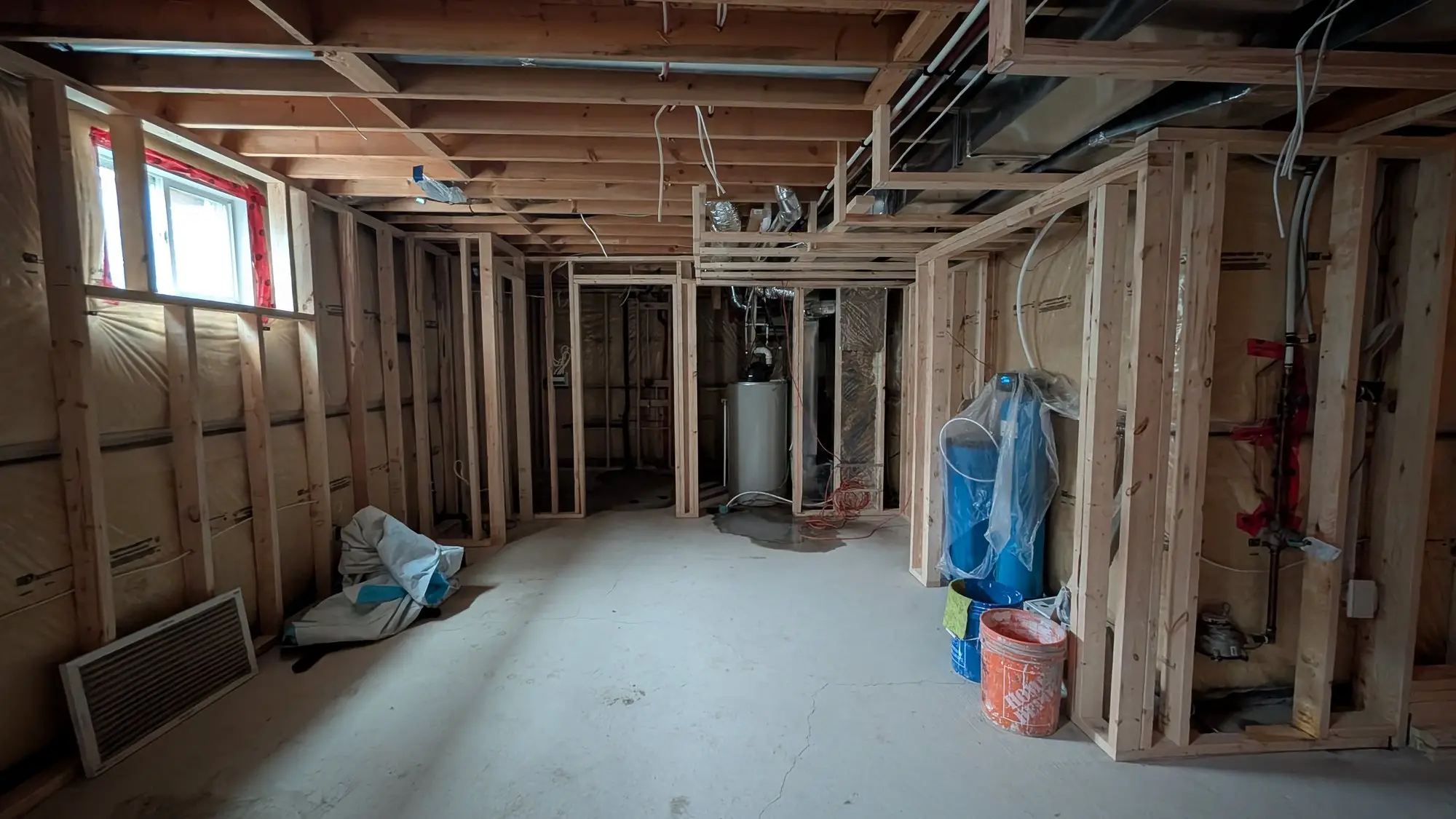 Wide view of the framed basement layout