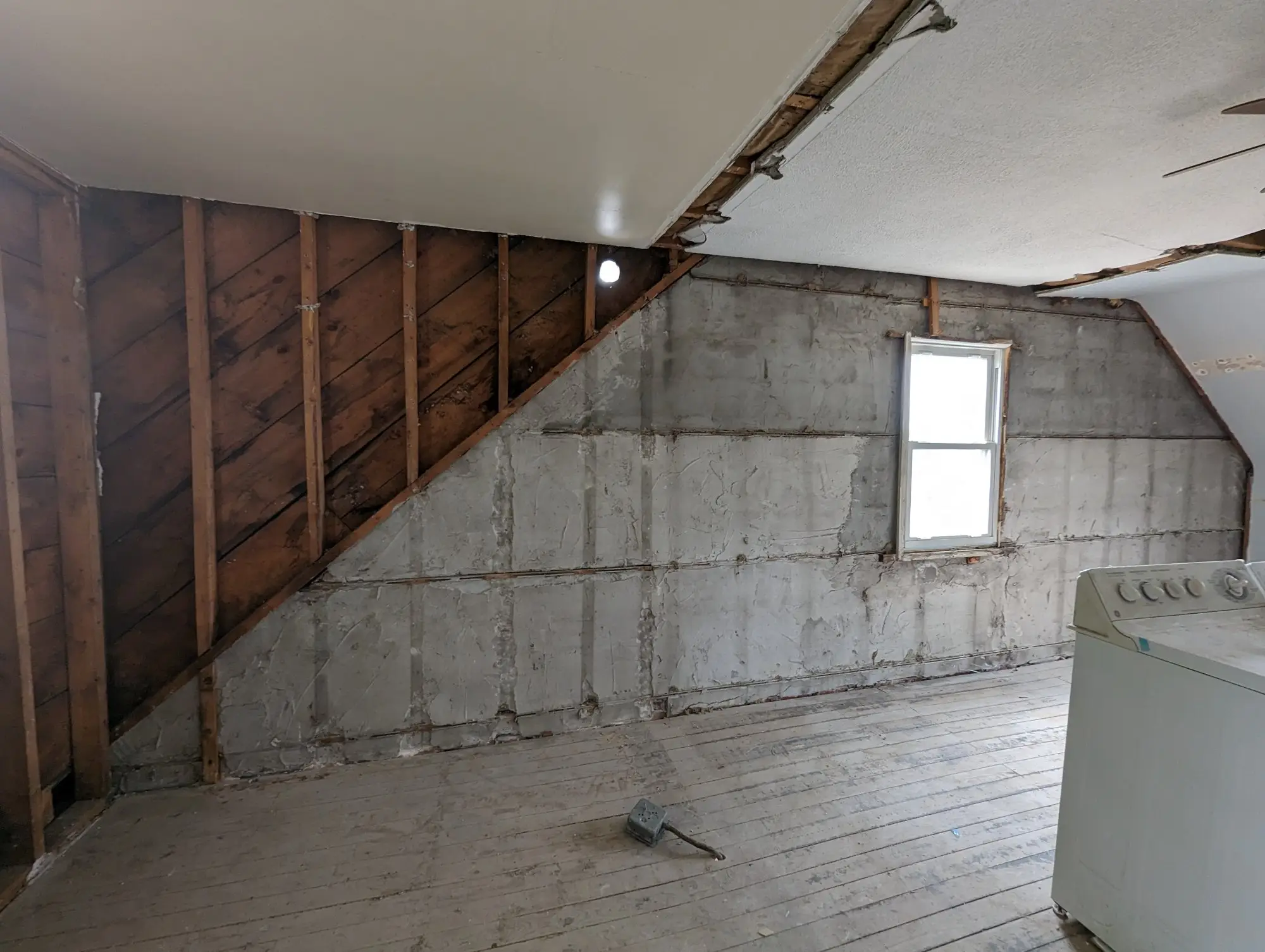 Second floor stripped out, showing the original wall construction