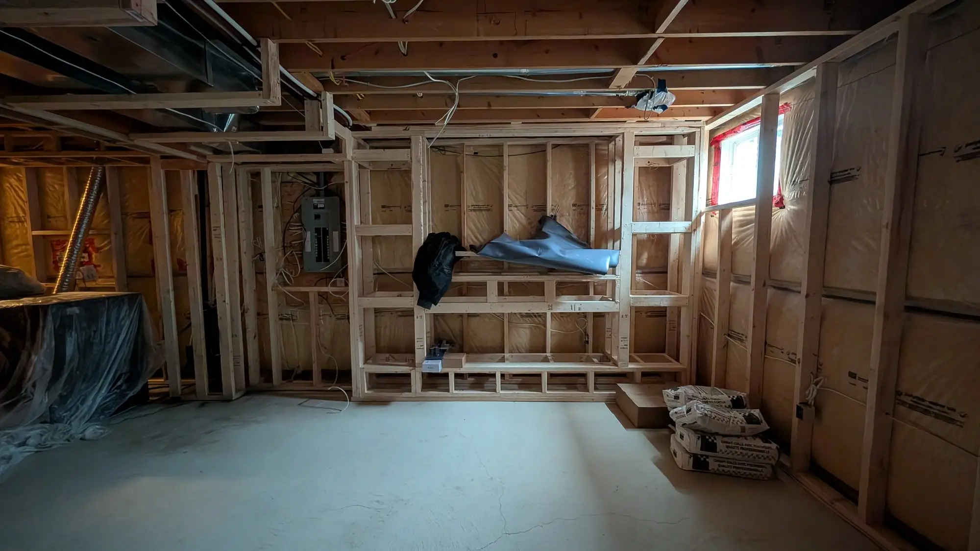 Partition framing dividing the basement into rooms