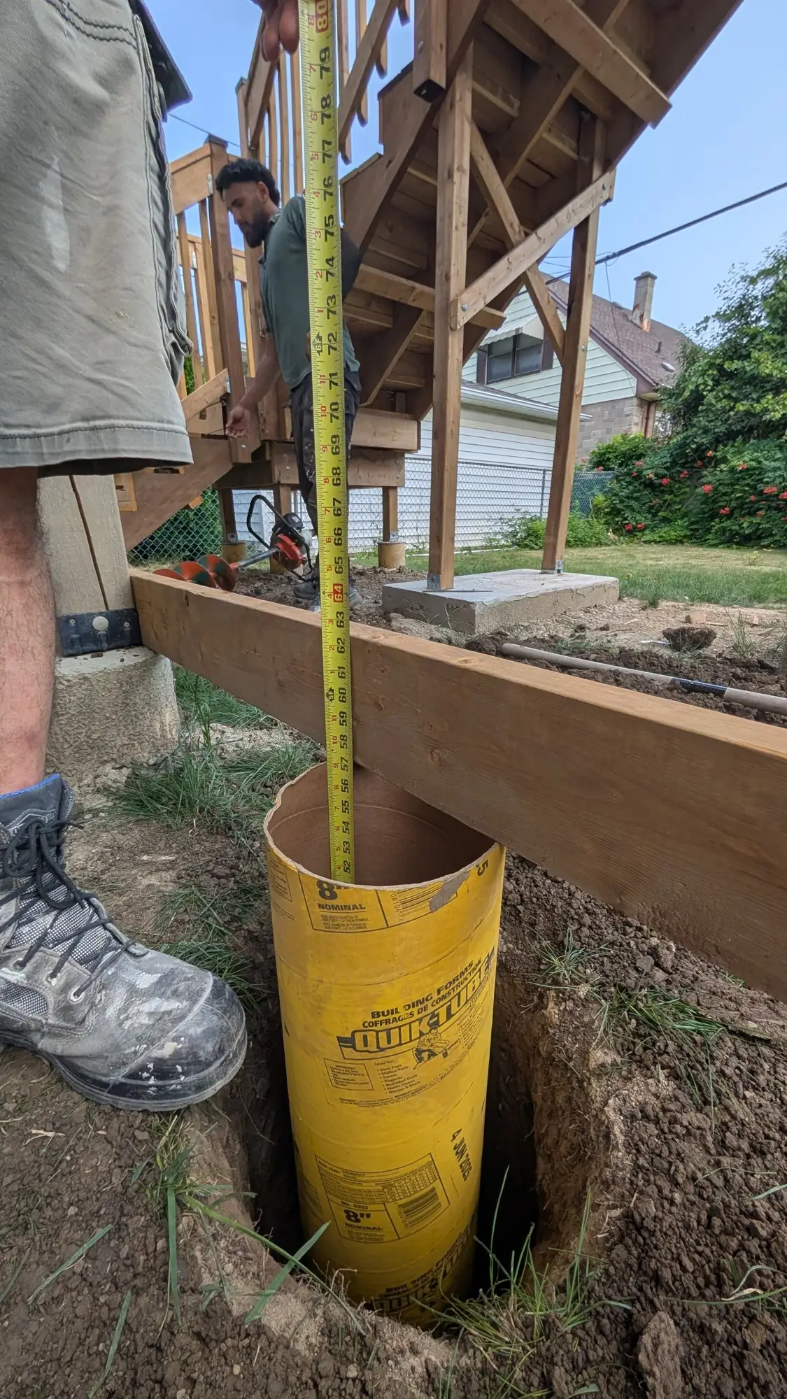 Sonotube footing dug and measured for the new rear deck structure