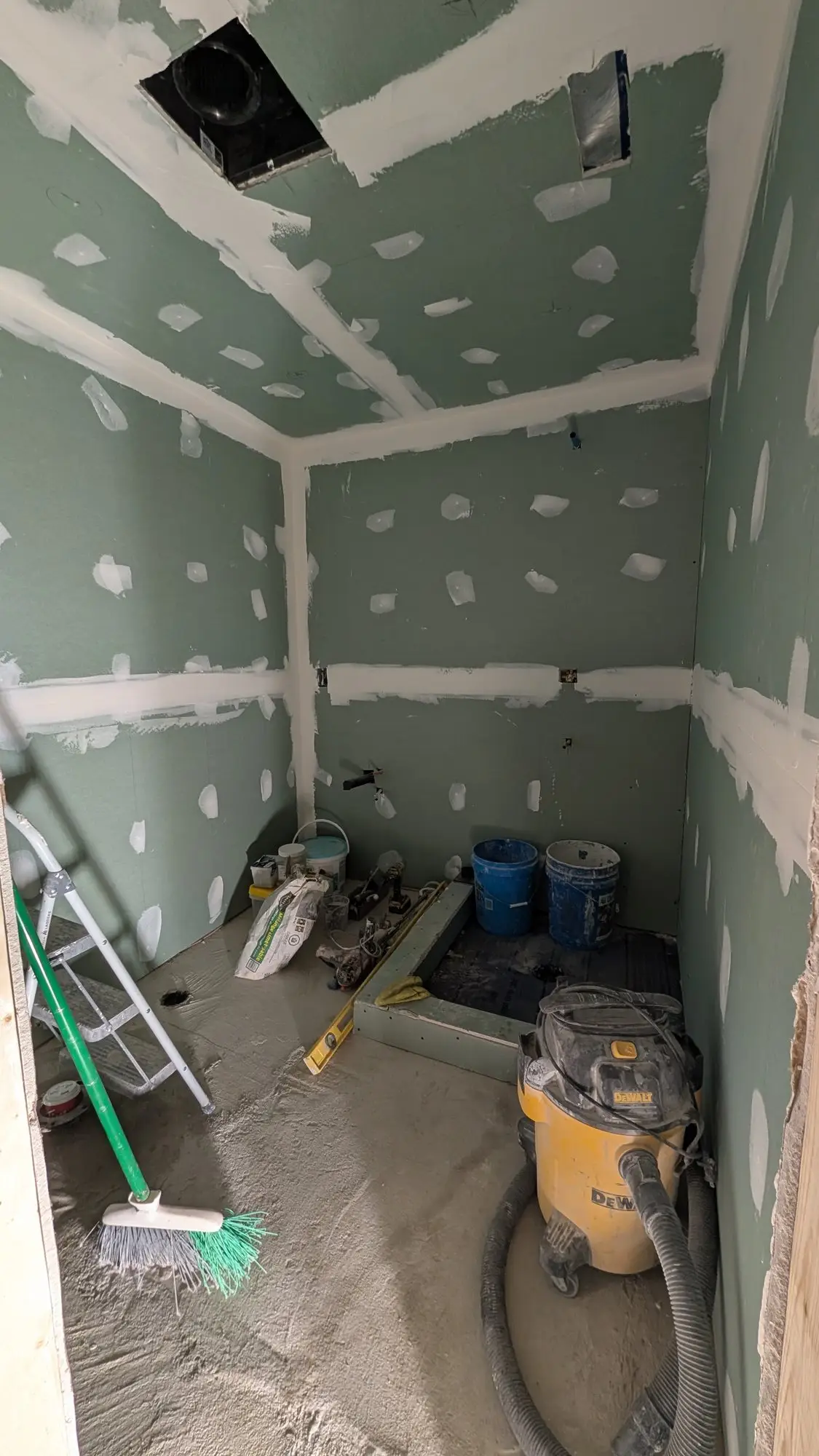 Mold-resistant board taped and finished in the wet area