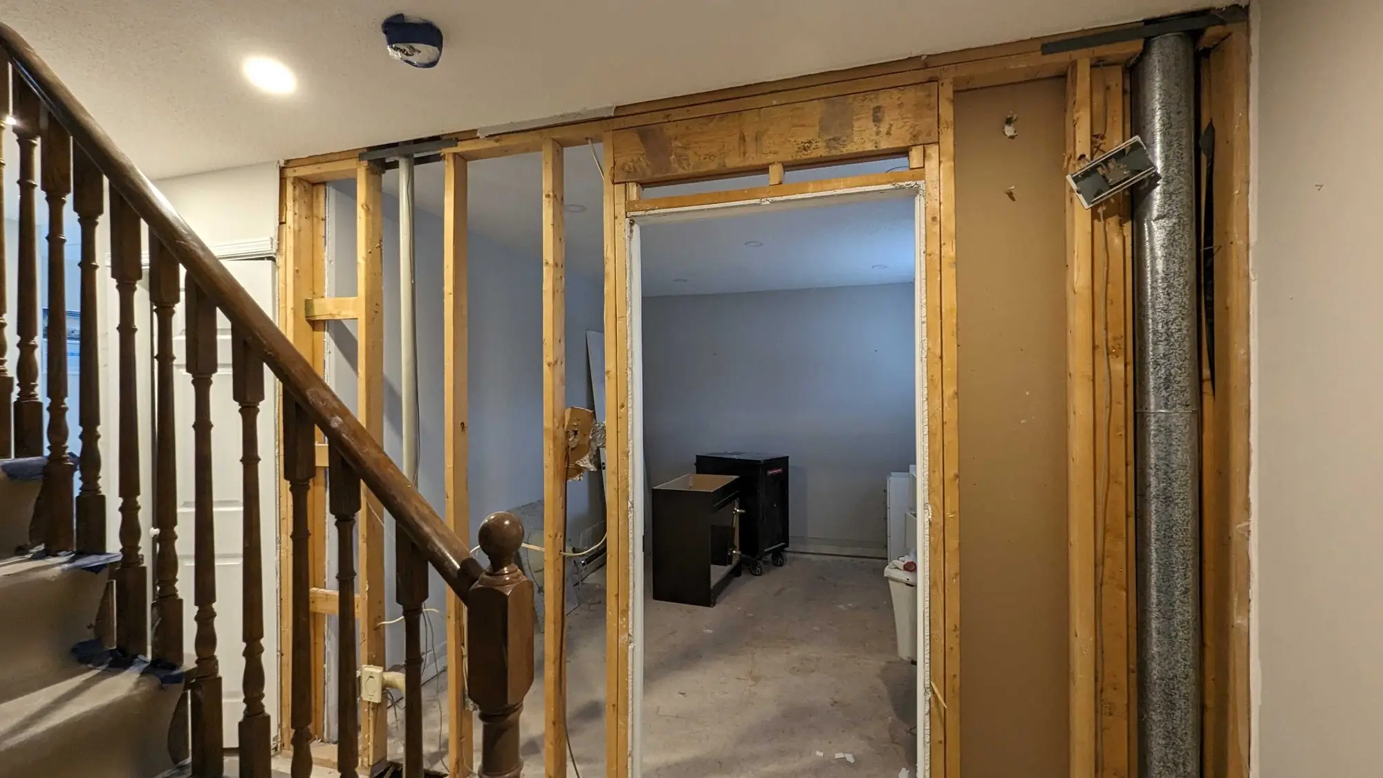 The existing interior stripped back to studs during renovation