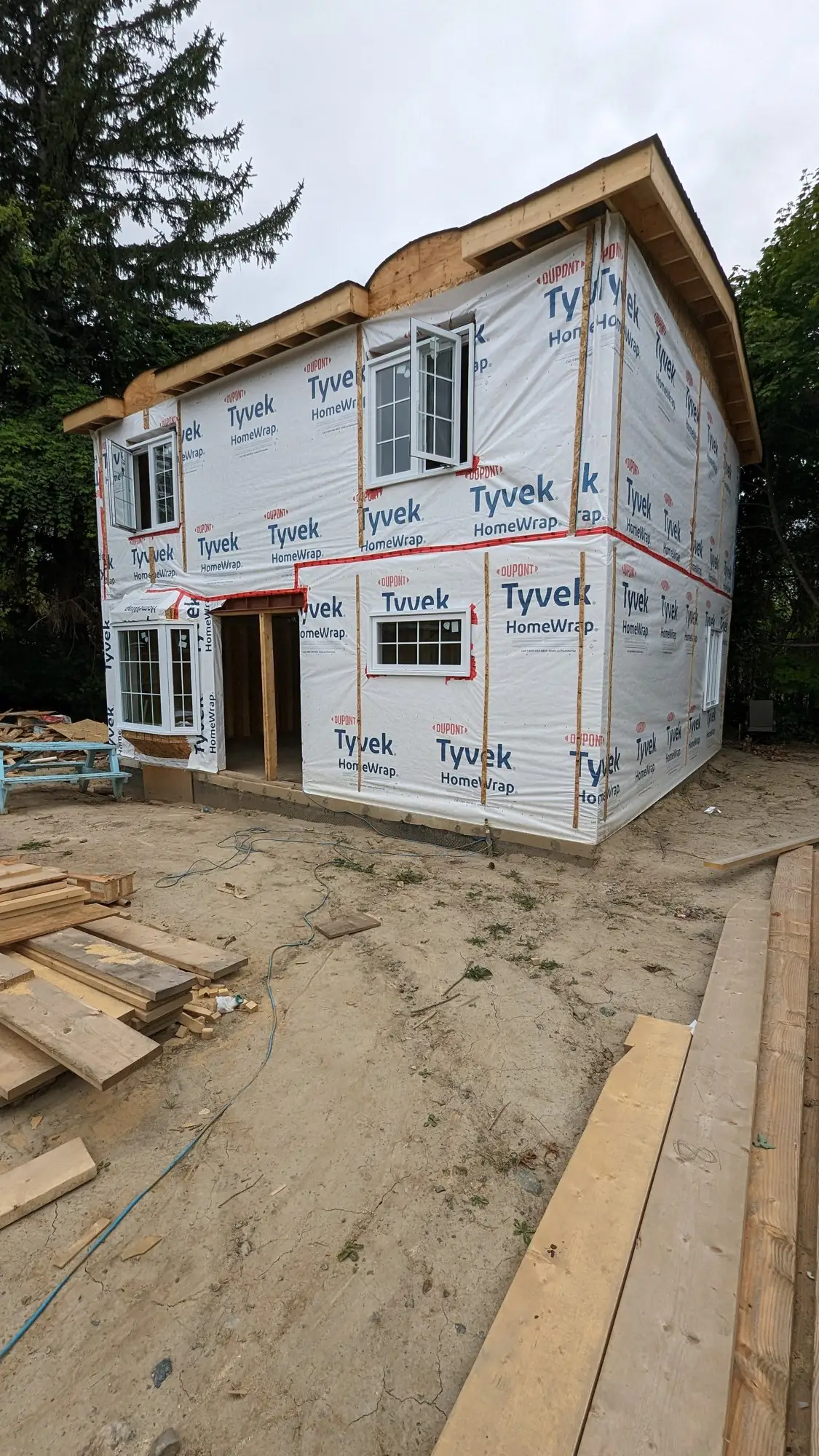 Sheathing and building wrap installed on the completed frame