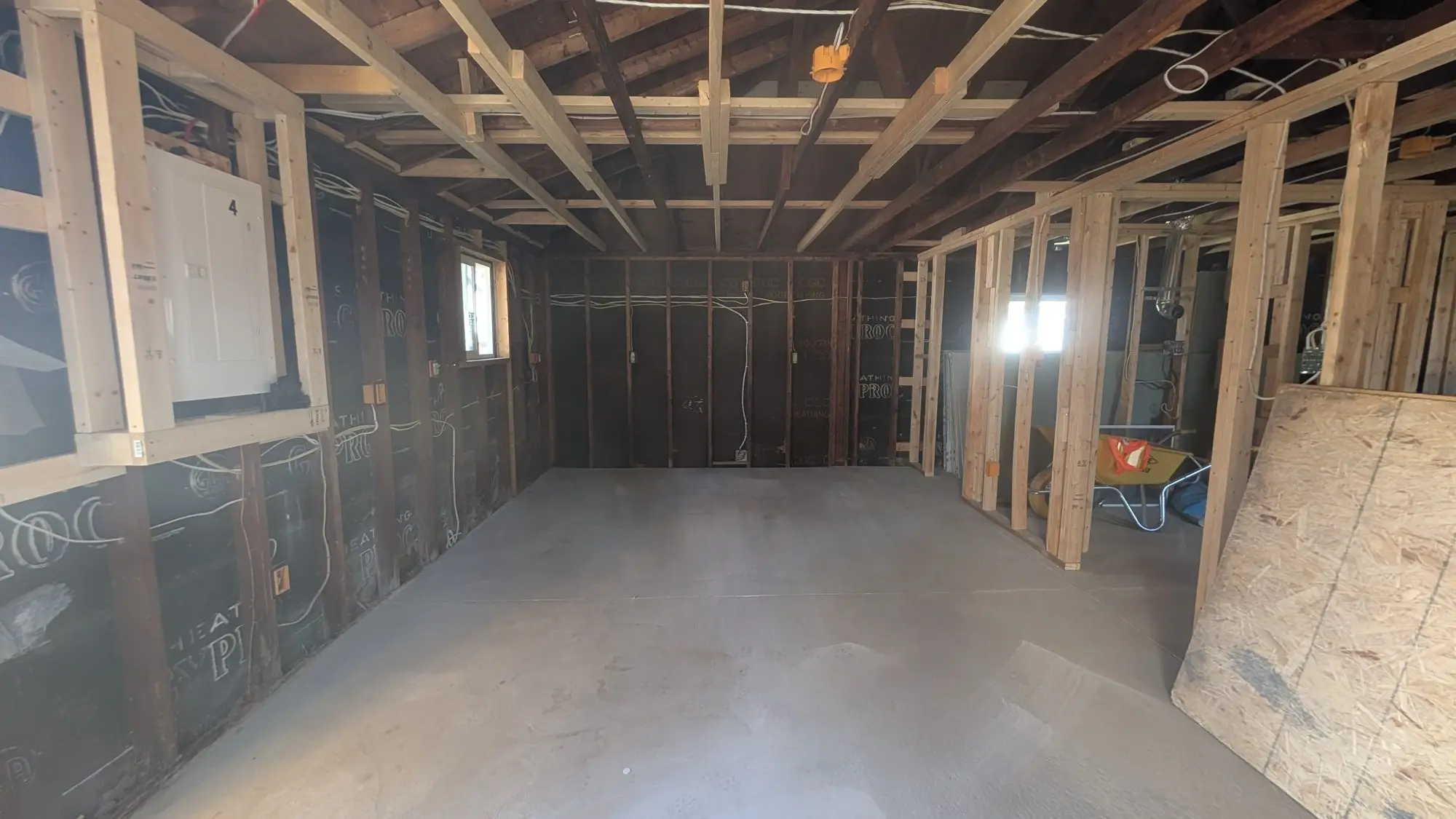 The detached garage framed out internally as the fourth self-contained unit