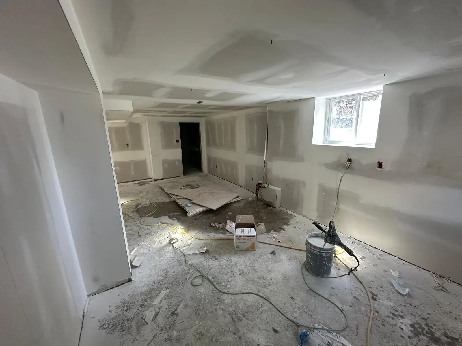 Main floor unit boarded and taped, ready for finishing