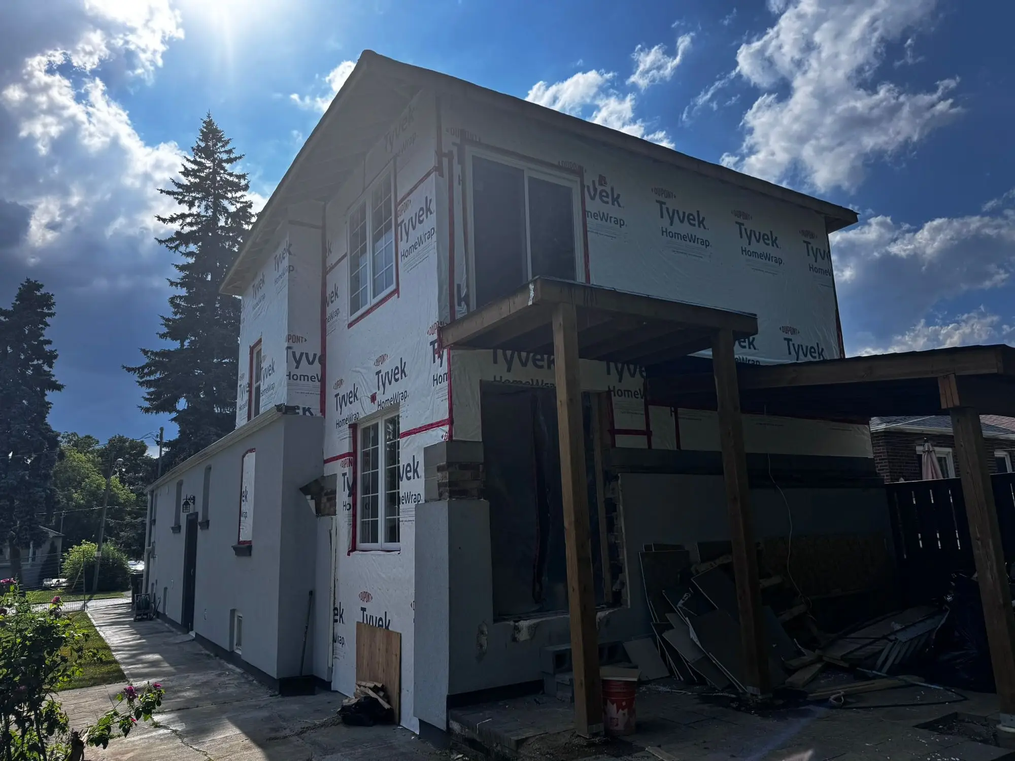 The two-storey house sheathed and wrapped against the weather