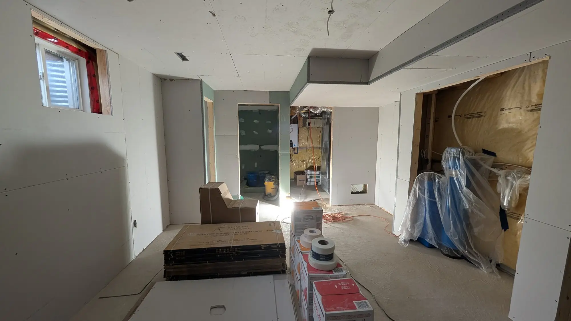 Bulkheads formed to carry ducting across the ceiling