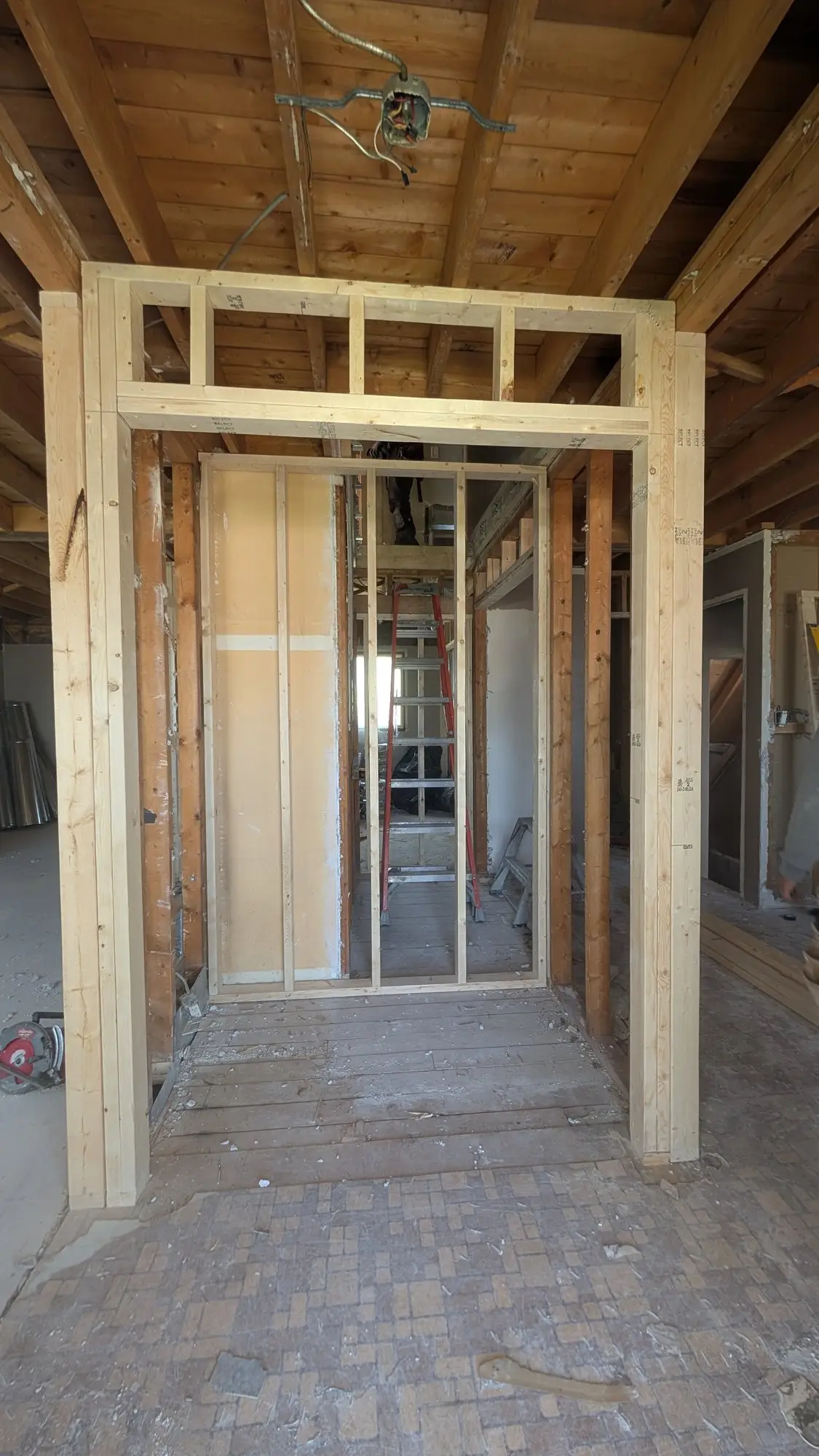 New structural opening framed between rooms