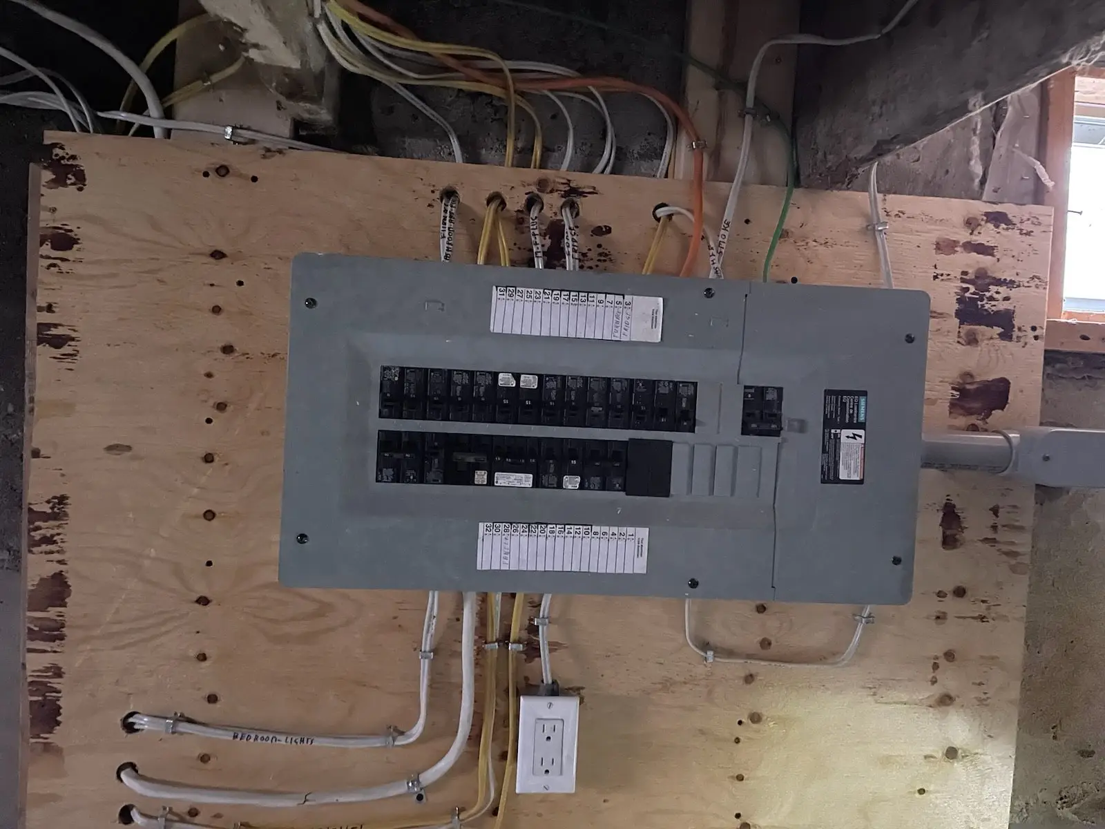 New electrical panel and rewire mounted on the backing board