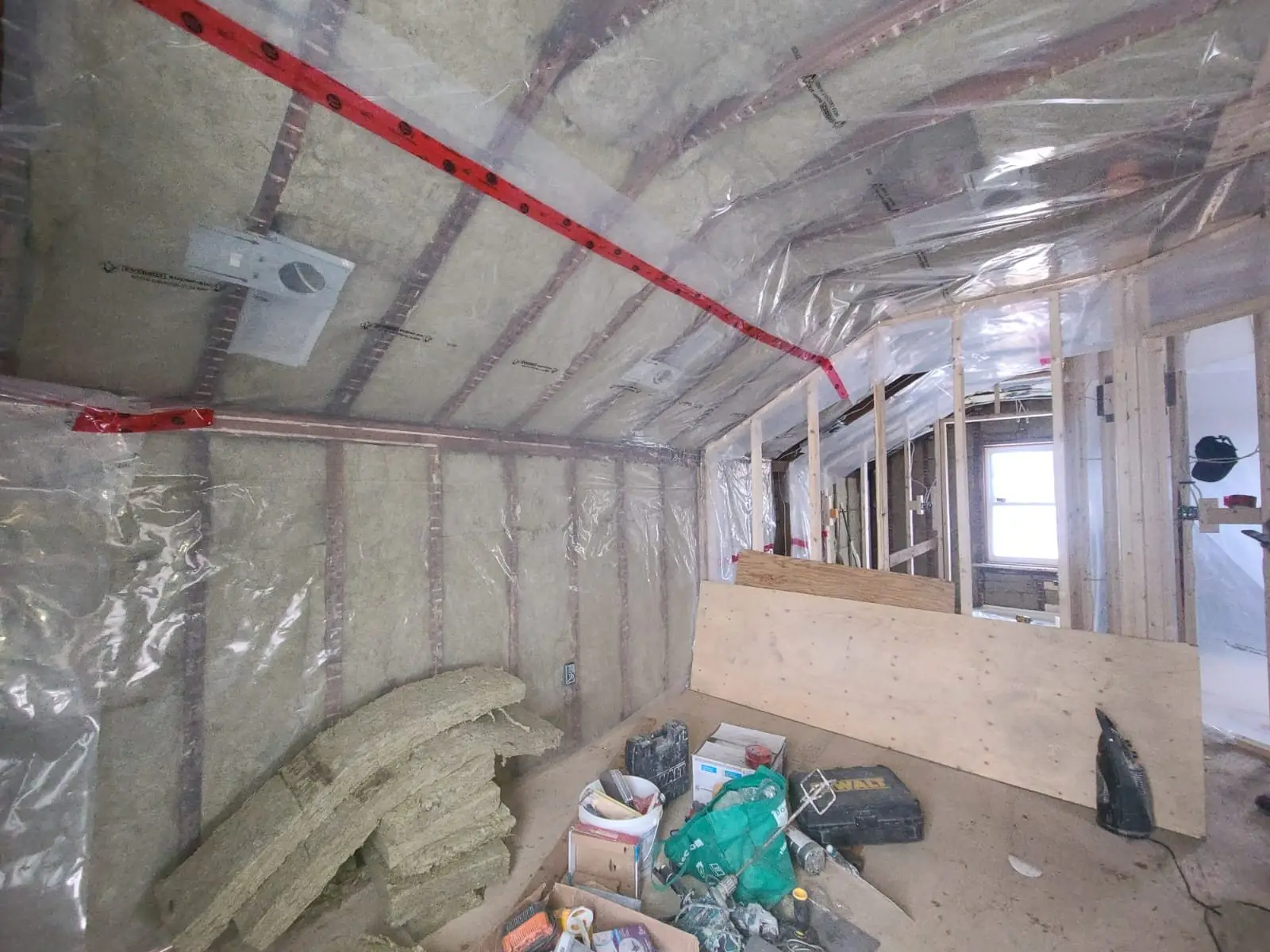 Vapour barrier sealed across the ceiling before boarding