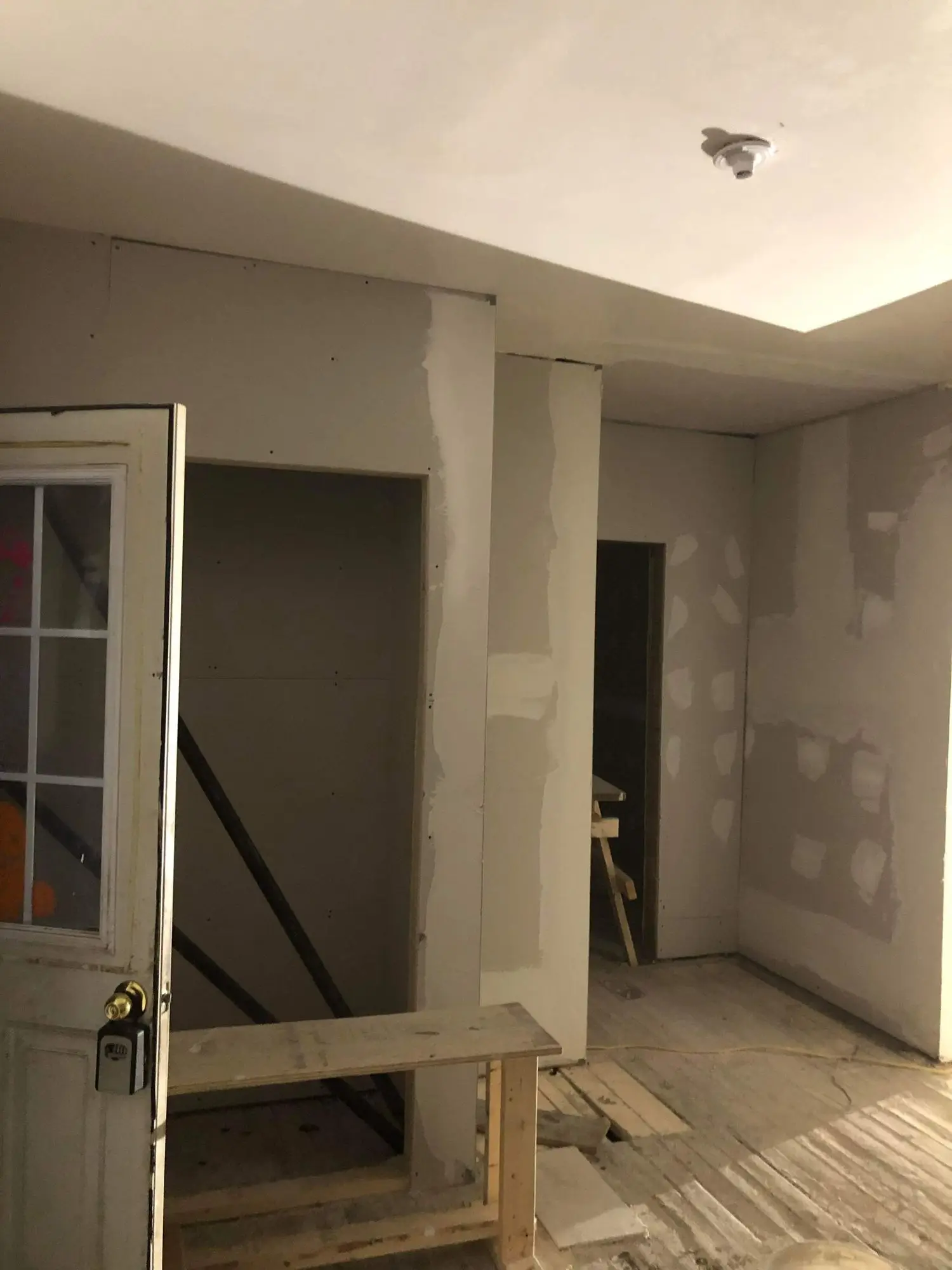 The new stairwell drywalled and ready for finishing