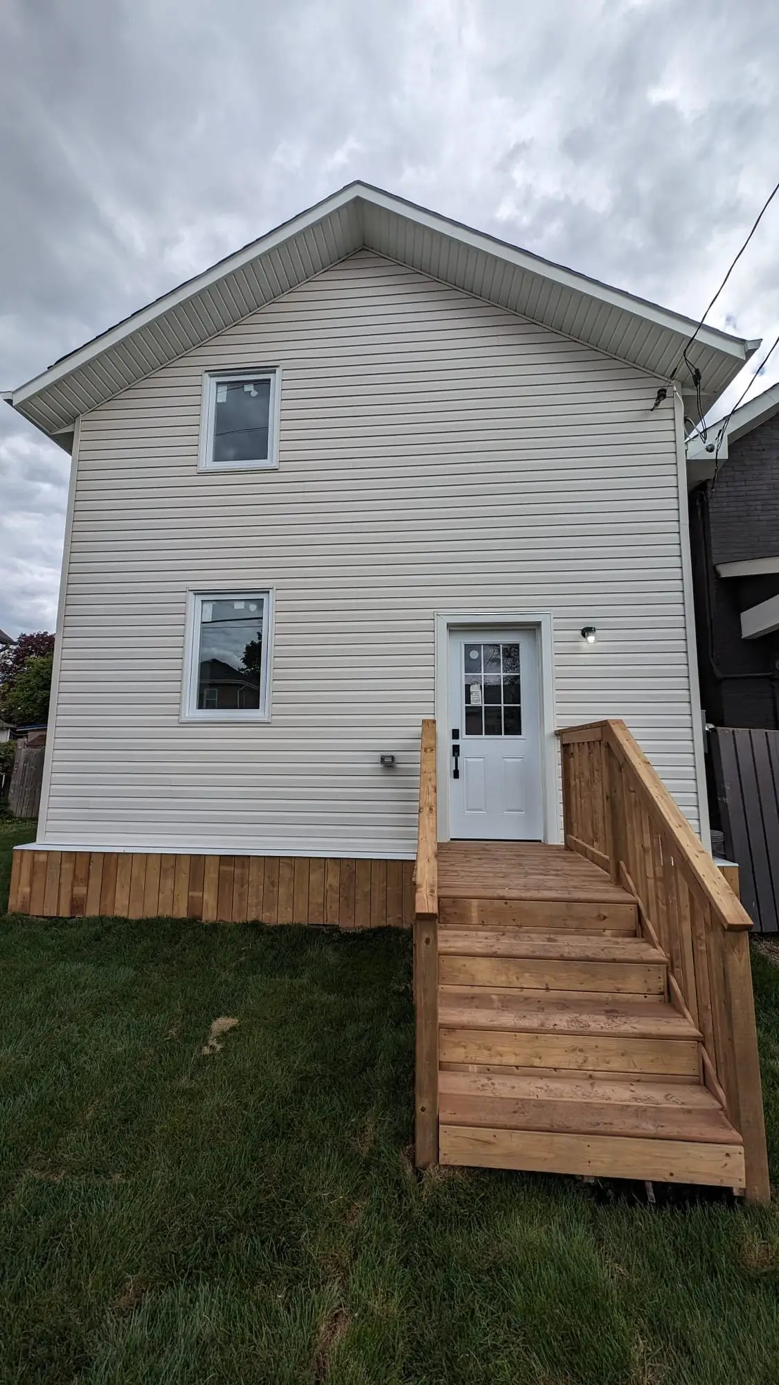 New rear entry deck and stairs on the finished house
