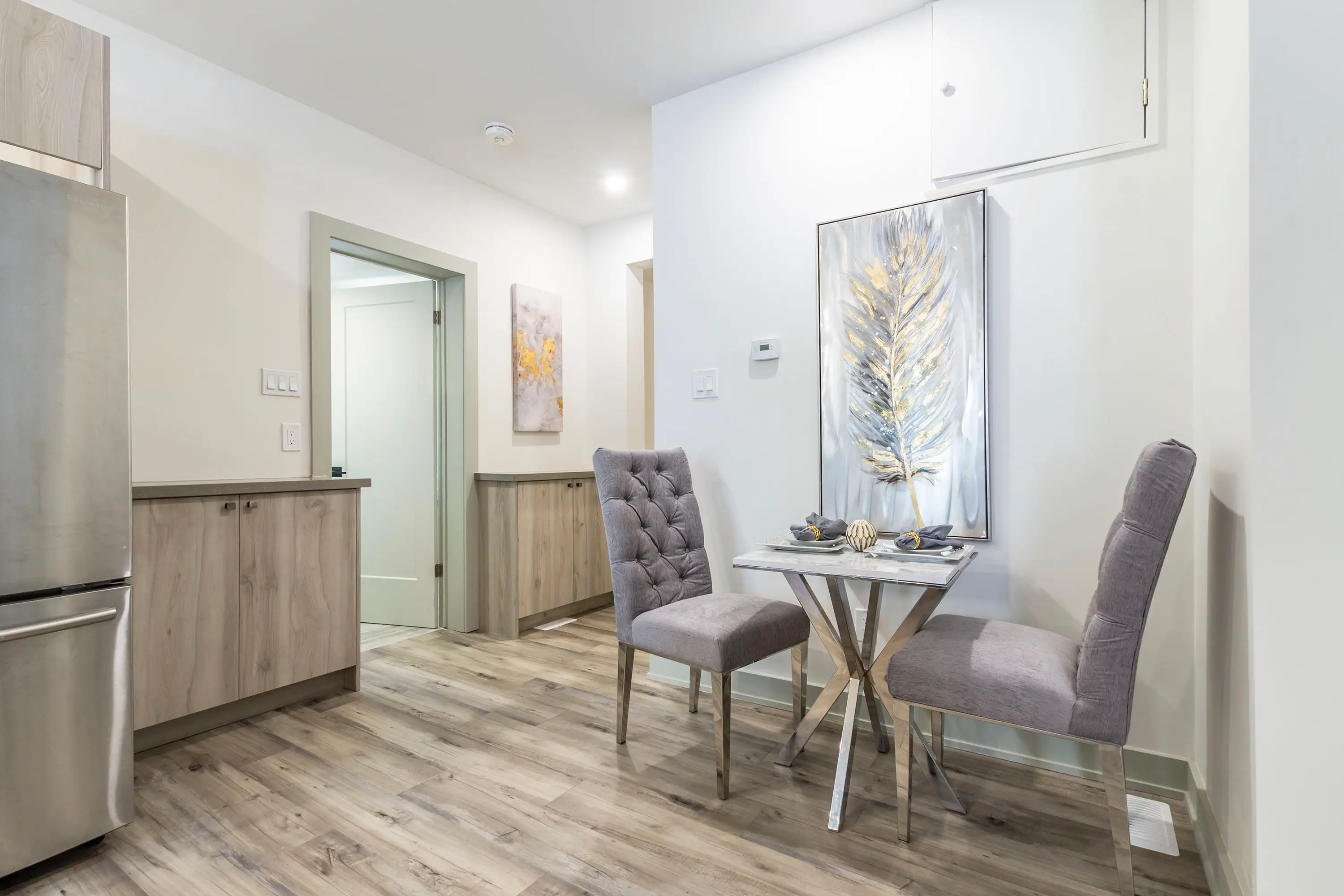 Completed flooring installation across an open-concept space