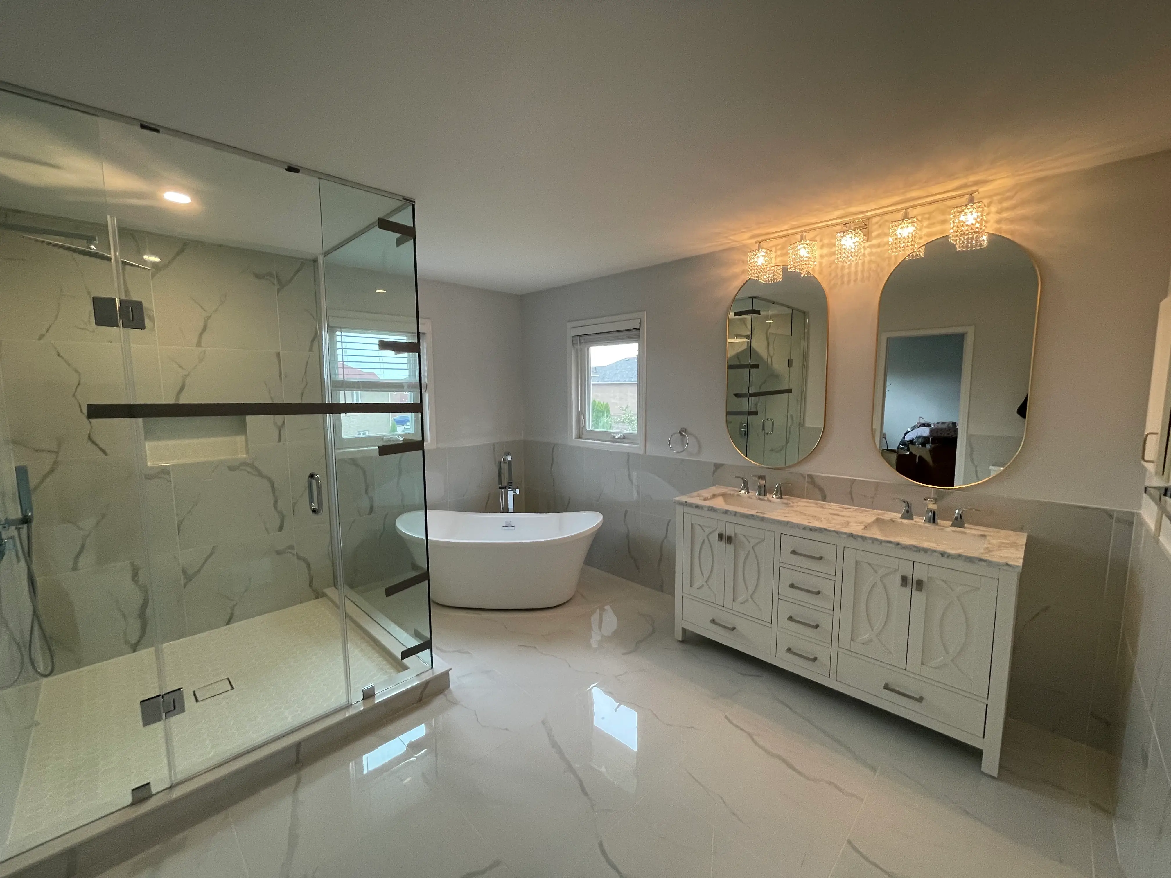 Full bathroom renovation with custom vanity