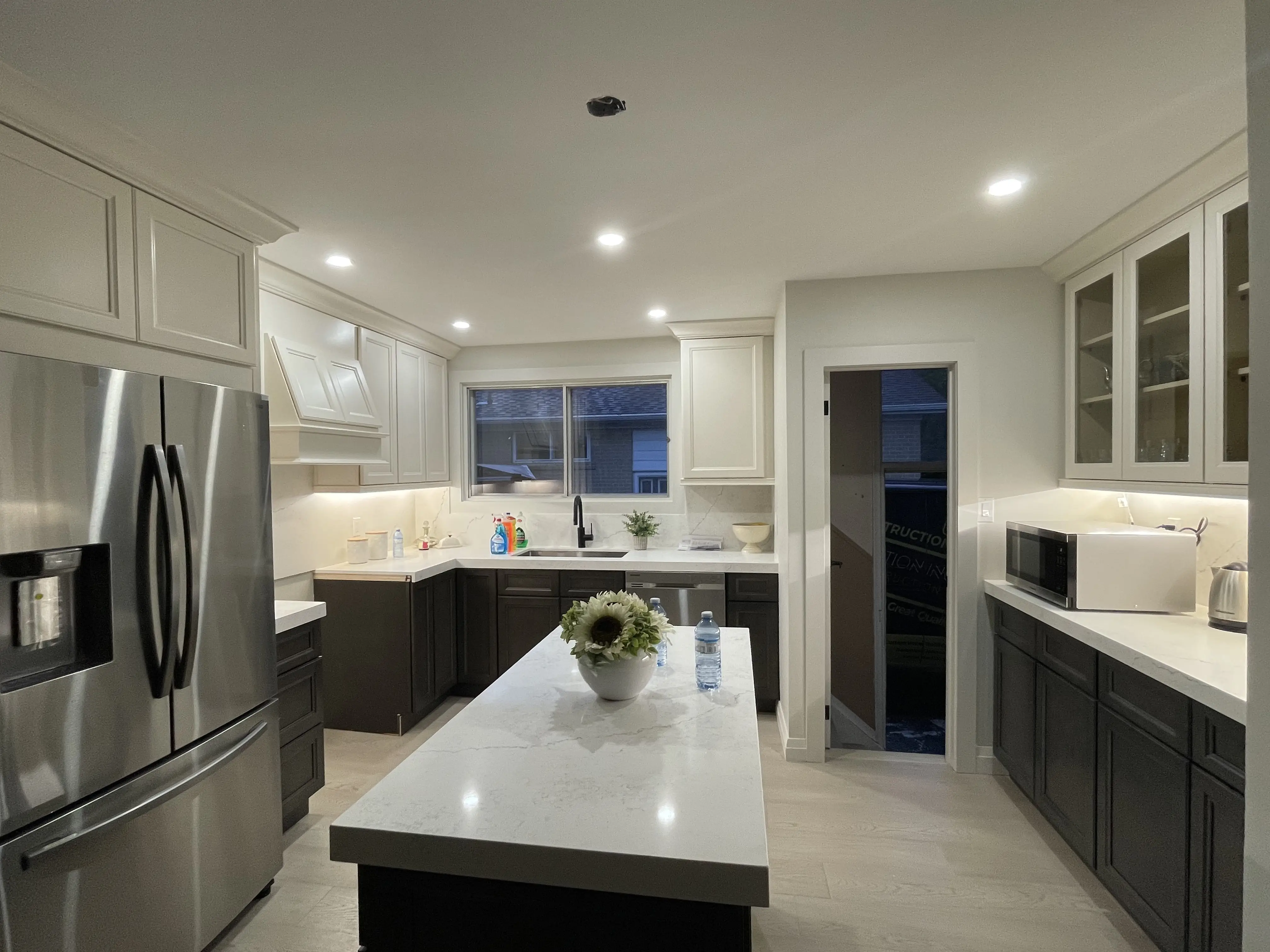 Quartz countertops with undermount sink in a renovated kitchen