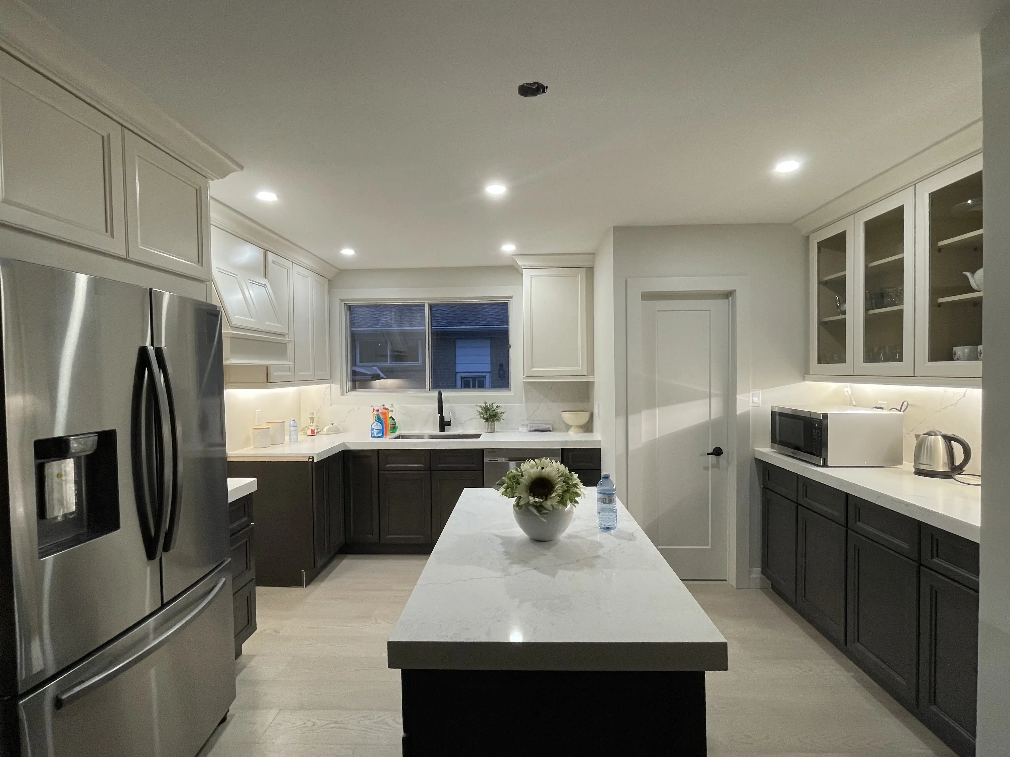 Quartz countertops installed by HMH Construction in a renovated kitchen